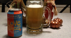 beer-chronicle-houston-craft-beer-review-karbach-love-street-can-next-to-beer-mug-filled-with-beer